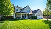 Beautiful suburban house with landscaped lawn, | Stock Illustration