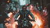 Action shot with man riding away on bike. Dynamic | Stock Foto
