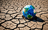Globe earth on dry ground, drought, environmental prote | Stock Illustration