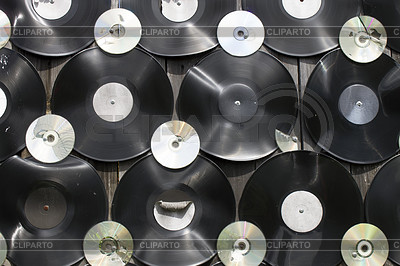 Old vinyl records and cracked compact discs are | High resolution stock photo |ID 6351379